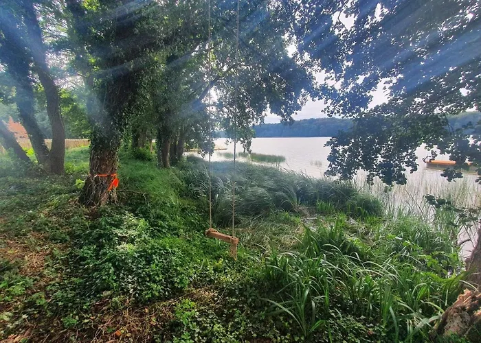 Apartment Gemuetliches Ferienhaus Mit Garten Und Seeblick By Interhome Appartement *